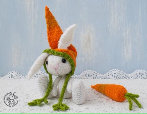 Easter rabbit with a carrot knitting pattern 